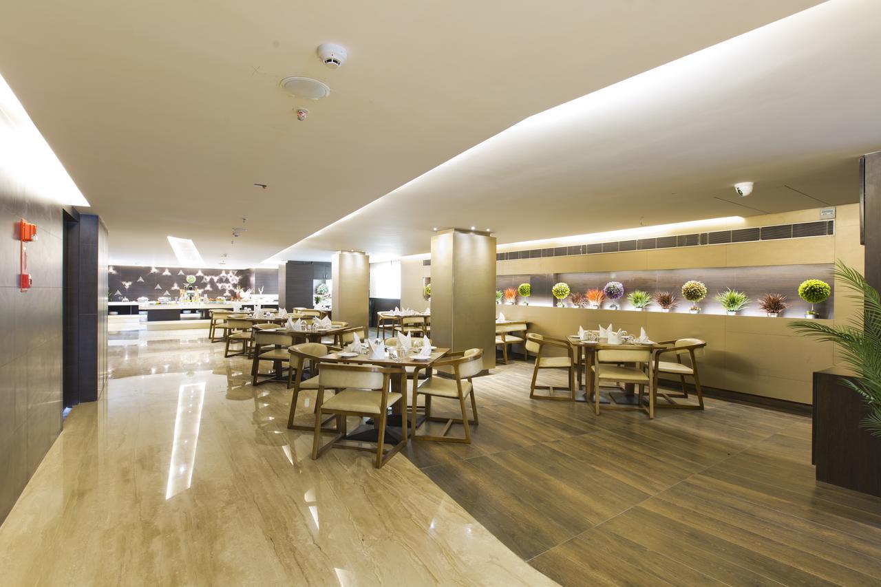 Attide Hotel Bangalore Bagian luar foto
